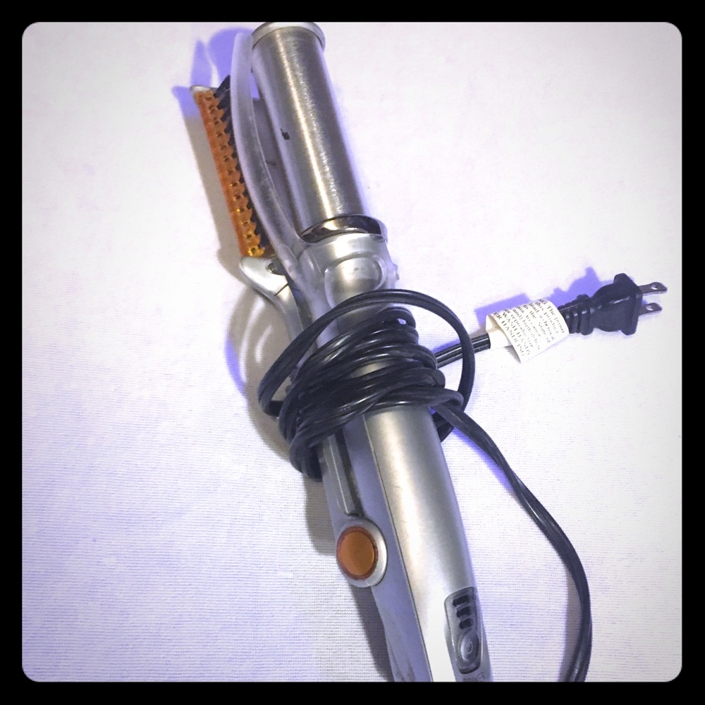 All in one curl and straighten instyler